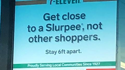 7-Eleven 'Get Close to a Slurpee, Not Other Shoppers' Window Sign